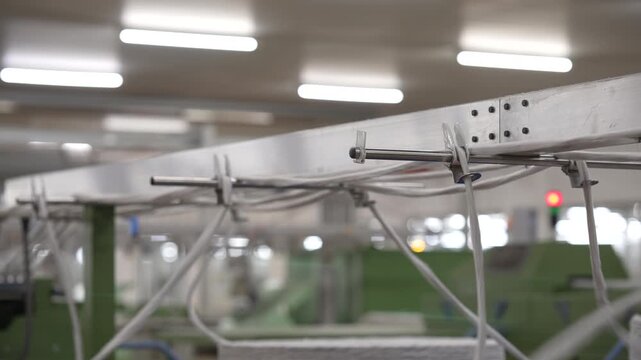 Yarn Guide Rods and Thread Flow in Automated Textile Production Line
