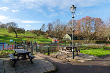 A deserted children's playground in Warminster pleasure grounds.  Winter sunshine