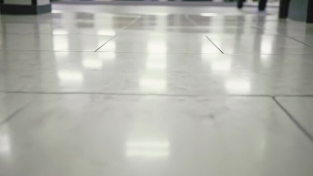Shiny tiled floor surface, interior, and flooring. Background of glossy tiles.