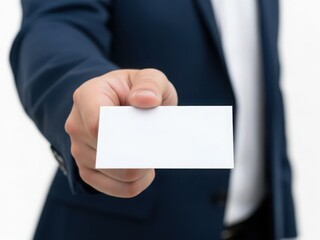 Businessman holding a blank business card