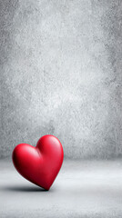 Red heart on a gray background.