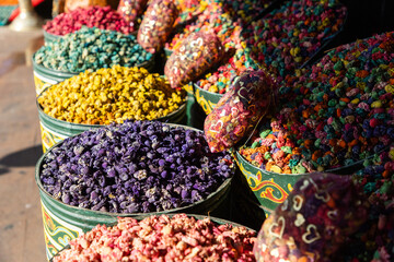 souvenirs and spices on the Jamaa el Fna market in old Medina, Marrakesh, Morocco