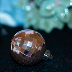 Rose gold ornament for a Christmas tree or holiday decor. 