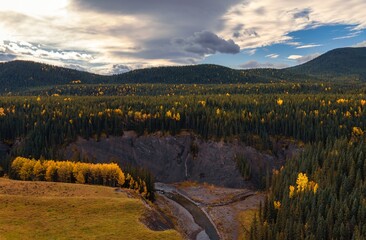 A Panoramic Lookout Of A Fall Mountain Valley Under A Cloudy Sky