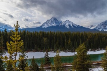 Cloudy Sky Over Banff Mountains And Forest