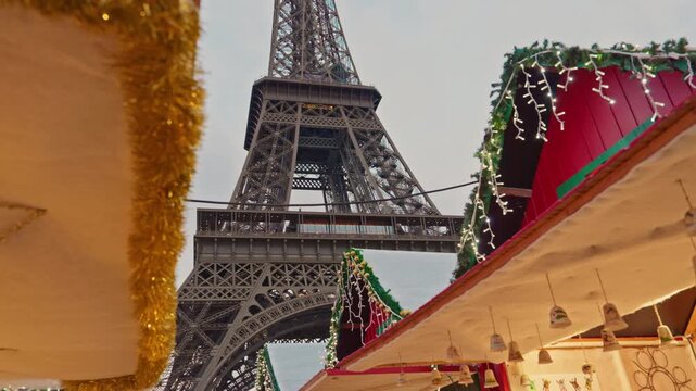 Paris, France - 10.12.2022 : Christmas market near Eiffel Tower. Crowd of people