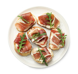 Delicious bruschettas with cream cheese, prosciutto and arugula isolated on white, top view