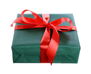 Beautifully wrapped gift box with red bow isolated on white