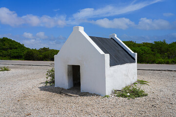 Historic white Slave Hut (Slave House) on the Salt Flats Coast of Bonaire in the Dutch Caribbean