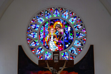 Stained glass window in the San Bernardo Catholic Church in Kralendijk on Bonaire island in the Caribbean Netherlands - Dutch Caribbean Colonial Architecture