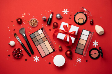 Christmas cosmetic, make-up products with holiday decorations.