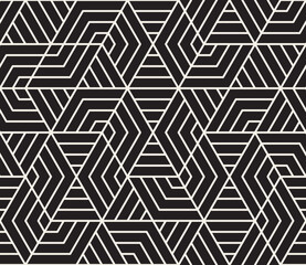 Vector seamless pattern. Abstract pattern of black and white interlocking hexagons with converging lines, creating an optical illusion and dynamic, modern feel.