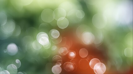 Abstract colorful background featuring green and orange bokeh lights