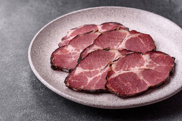 Meat, smoked ham, or pork sausage sliced for breakfast sandwiches. Sliced ham