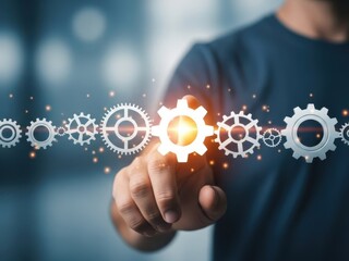 A person interacting with glowing gears and cogs on a blurred background with a technological feel