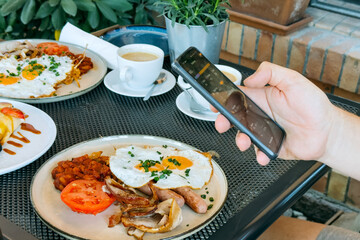 Smartphone displays nutrition tracking interface with macro breakdown. Nutrition tracking, calorie counter app, digital health, healthy lifestyle technology.