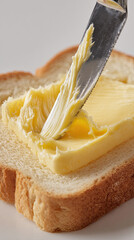 Spreading Butter on Fresh Bread 