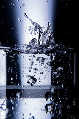 11.Water Pouring and Splashing onto Ice Cubes