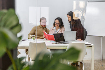 Collaborative team meeting in a modern office setting