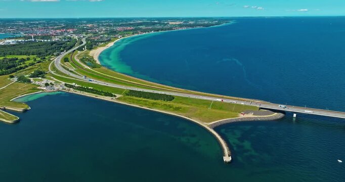 Aerial view of Great Belt Bridge at summer. The iconic sea crossing. Denmark modern engineering design. Denmark