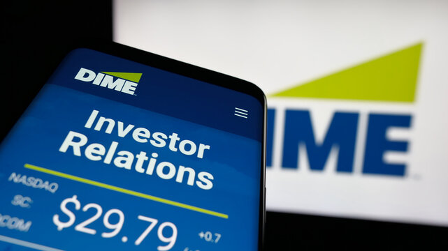 Stuttgart, Germany - 12-05-2025: Mobile phone with website of US financial company Dime Community Bank on screen in front of logo. Focus on top-left of phone display.