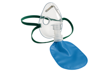 Medical oxygen mask with green strap and blue reservoir bag isolated on white