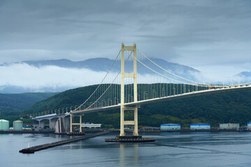 Muroran, Hokkaido, Japan - Oct 04 2024, panoramic view of the cable-stayed Hakucho Bridge, at daytime, Muroran, Japan