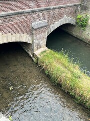 A canal running in between old buildings
