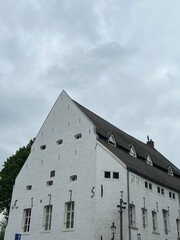 The side of a white brick building