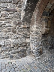 Inside of a stone and brick archway
