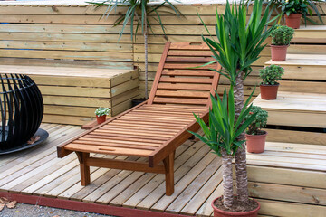 Wooden Sun Lounger on Outdoor Patio Deck