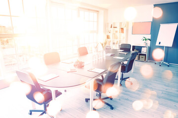 Interior of office with table prepared for meeting