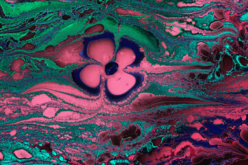 Abstract colorful ebru marbling art with floral pattern texture background