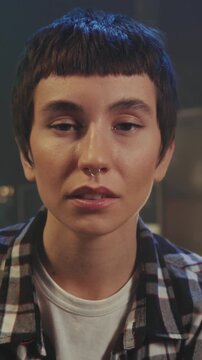 Intimate artistic portrait, Youthful individual under soft lighting, Expressive person with vintage film effects