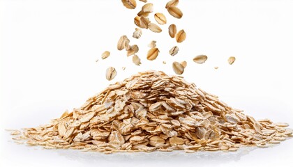 rolled oats falling onto pile isolated on a white background