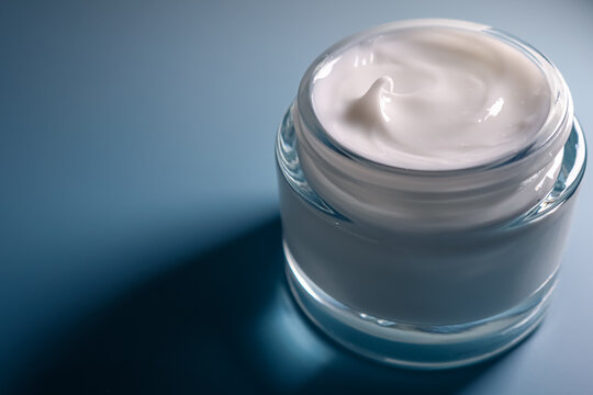 Skincare cream in glass jar, a premium beauty product for daily hygiene and moisturizing routine