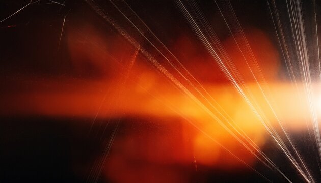 abstract scratched damaged retro analog film effect red yellow orange light leaks rays grainy dust noise texture on black background blurred vintage cinematic distressed grunge overlay