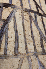 Close-up of a section of wall of a medieval house in a French village