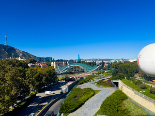 Modern Bridge of Peace Over Kura River in Tbilisi Georgia © EwaStudio