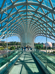 Modern Bridge of Peace Over Kura River in Tbilisi Georgia © EwaStudio