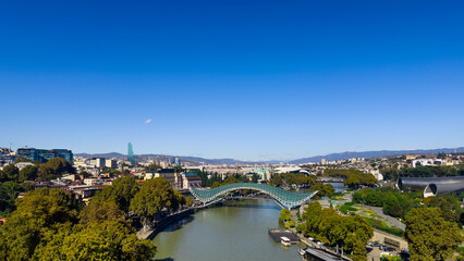 Modern Bridge of Peace Over Kura River in Tbilisi Georgia © EwaStudio