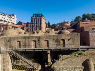 Fototapeta premium Historic Abanotubani Sulfur Baths and Brick Domes in Tbilisi Georgia