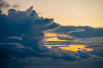 Dramatic Sunset Sky with Golden Light and Dark Storm Clouds