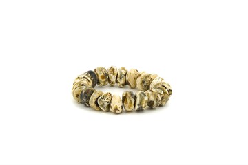 Obraz premium Natural Baltic chalk amber bracelet photographed in studio on white background