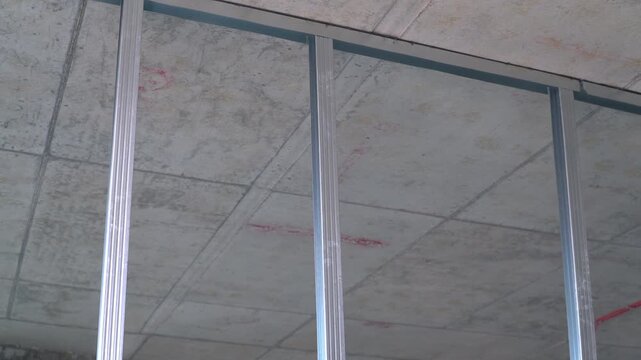 Metal studs form the frame for drywall