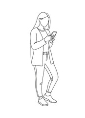 Fototapeta premium Young woman using smartphone while standing in casual outfit 