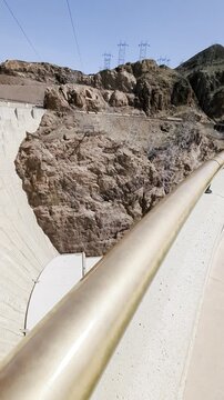 Hoover Dam sweeping panoramic view. Right to left horizontal pan.