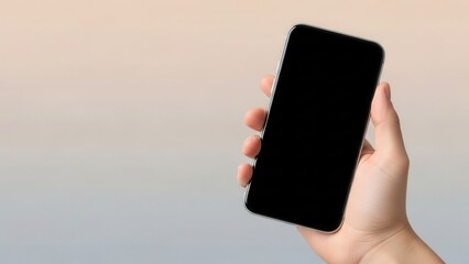 A hand holding a smartphone with empty screen against a soft gradient background for tech presentation