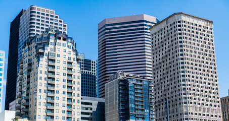 Fototapeta premium City architecture of skyscraper. City building cityscape view. Skyscraper cityscape. Modern city downtown. Business city. Cityscape of skyscraper building in business district. Massive skyscrapers