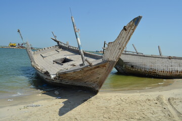 Detail and closeup of old and colored boat wooden hull, 